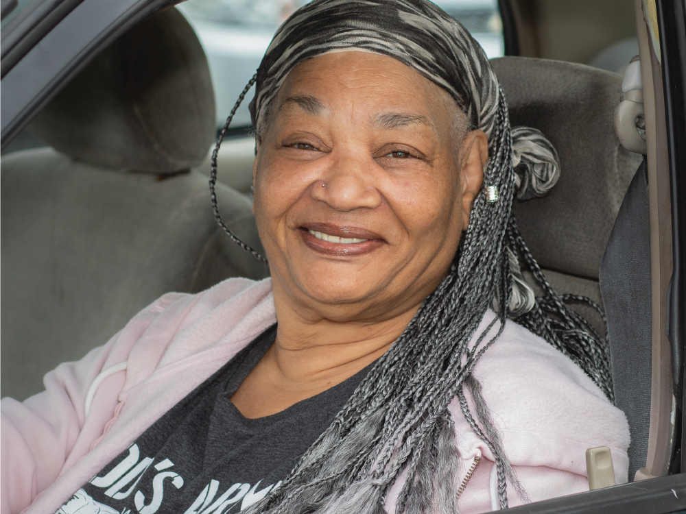 Senior Woman Sitting in Car