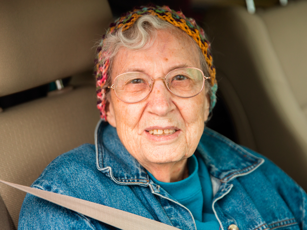 Senior Woman Sitting in Car