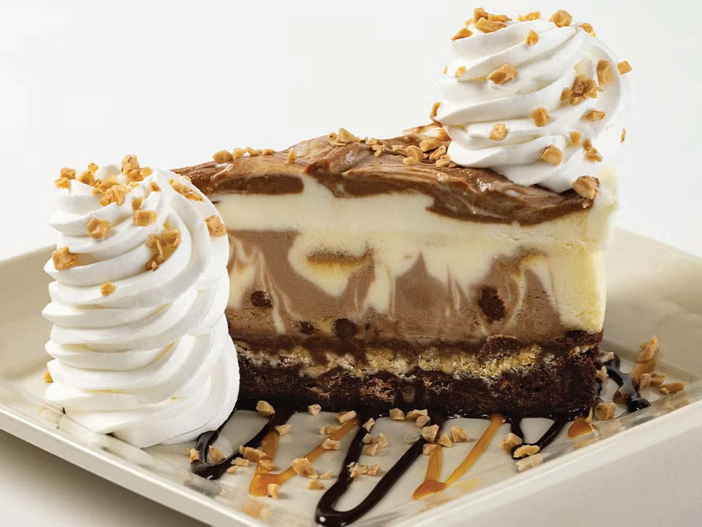 Brownie Crunch Choc-a-Lot Cheesecake Milk and White Chocolate Marbled Cheesecake on a Crunchy Toffee Brownie