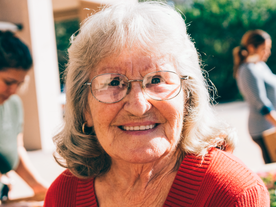 Senior Woman in Red Shirt